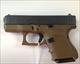 Glock 26 Gen 4 in FDE with 3 standard capacity mags