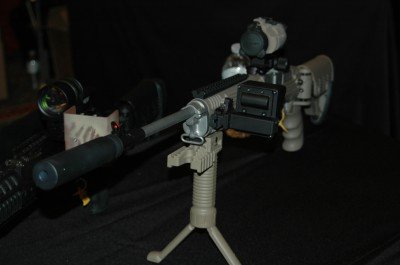 photo 4 Here is an all-out accessorized Mini-14 with suppressor.