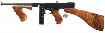 lot110 Several areas of collecting are represented including minis. I counted 17 ranging from miniature flintlock blunderbuss with a carved ivory stock and functioning lock to this Thompson 1928 sub gun with detachable magazine and shoulder stock. It even simulates open-bolt operation and has a functional safety.