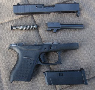 The G42 comes apart like other Glocks. You have to drop the mag, then lock the slide back, then pull down the release, then drop the slide and pull the trigger for the slide to come off the front.