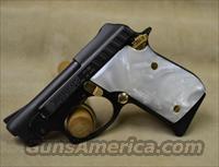 Taurus PT25 Black/White Pearl/Gold Accent - 25 ACP  Taurus Pistols/Revolvers > Pistols > Steel Frame