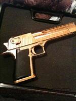 .50 cal gold striped desert eagle  Magnum Research Pistols