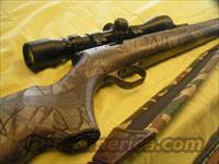 Camo Thompson Center Black Diamond XR with Scope  Thompson Center Muzzleloaders > Hawken Style