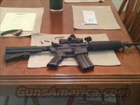 bushmaster ar-15 .223 new with busnell red dot scope  Bushmaster Rifles > Complete Rifles