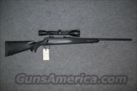 Remington Model 700. Black. With Scope  Remington Rifles - Modern > Model 700 > Sporting