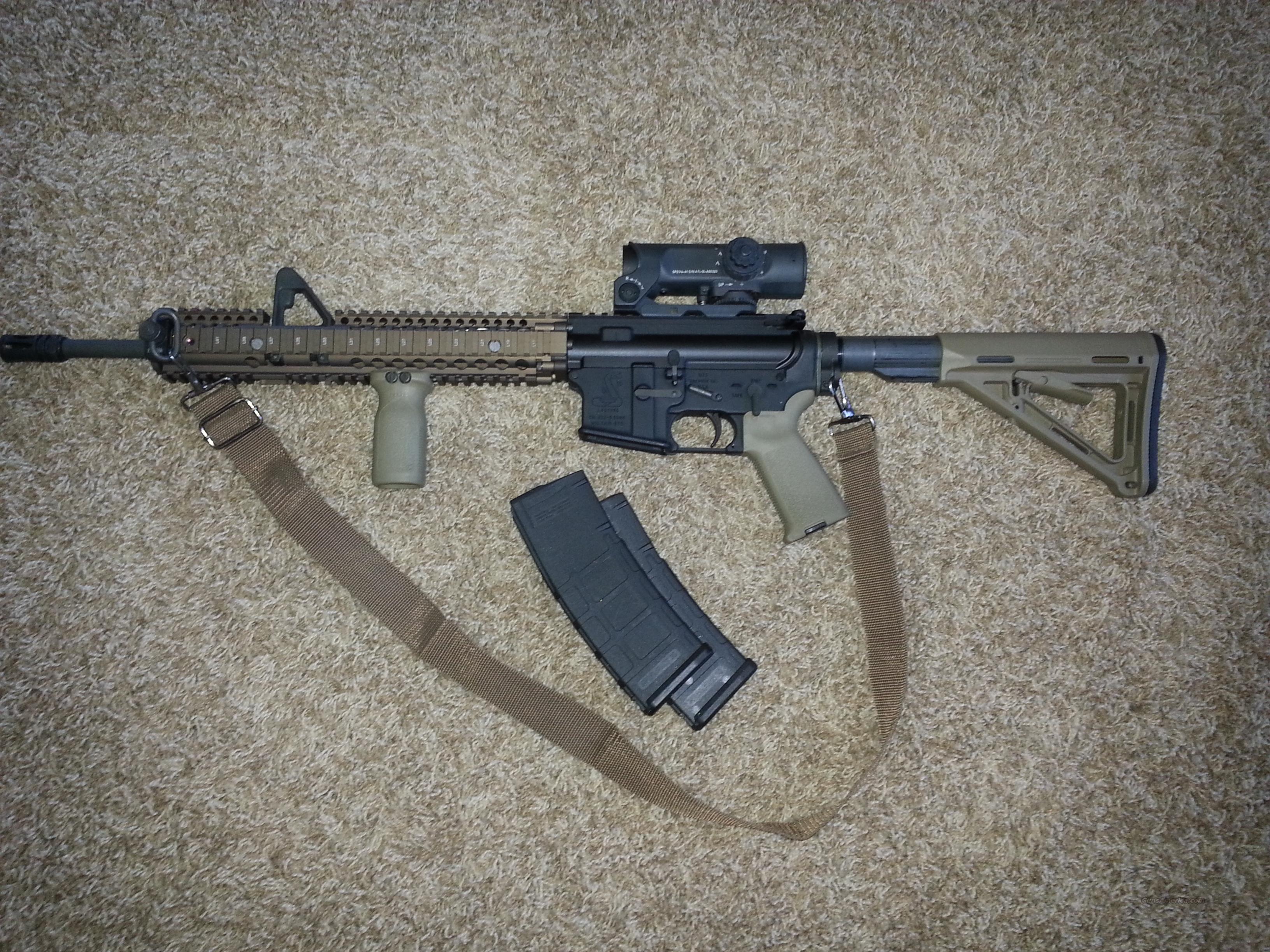 Bushmaster AR15 w/ Daniel Defense quad rail /... for sale