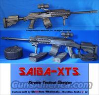 SAIGA-XTS 12 GA. XTREME TACTICAL SHOTGUN PACKAGE! TWO 10RD MAGS+12 ROUND DRUM+20 ROUND DRUM+GUN-KOTE™ FINISH+M4 COLLAPSIBLE STOCK+ITA RED/GREEN SCOPE WITH DUAL MOUNTS+VERTICAL FOREGRIP WITH LED LIGHT+MORE!  Saiga Shotguns > Shotguns