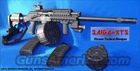 SAIGA-XTS 12 GA. XTREME TACTICAL SHOTGUN PACKAGE! GUN-KOTE™ PREMIUM FINISH+ALUMINUM QUAD-RAIL+M4 COLLAPSIBLE STOCK+UTG LASER/TACTICAL LIGHT COMBO+REFLEX SIGHT+12 AND 20 ROUND DRUMS+MORE!!  Saiga Shotguns > Shotguns