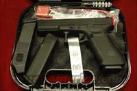 GLOCK NEW MODEL 17 GENERATION 4 9MM  FACTORY RECONDITIONED WITH TRIJICON NIGHT SIGHTS AND 3 HIGH CAPACITY MAGAZINES NEW   Glock Pistols > 17