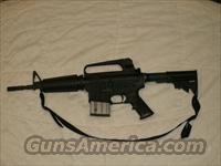 Bushmaster M4A2 "Post Ban" Semi Automatic Carbine .223 Remington/5.56x45mm NATO 14.5" M4 Barrel with Izzy Muzzle Brake 10 Rounds Black M4 Fixed Position Buttstock Black Anodized  Bushmaster Rifles > Complete Rifles