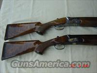 Pair of Angelo Bee Engraved 585s  SKB Shotguns > Hunting