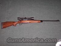 REMINGTON/MODEL 700 BDL/DELUXE WALNUT STOCK/EMBELLISHED ENGRAVED RECEIVER/MOUNTED LEUPOLD VX II 3X9 SCOPE /7MM MAG  Remington Rifles - Modern > Model 700 > Sporting