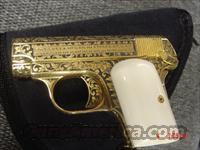 Colt 1908 25 acp,full 100%deep relief engraved,Sam Colt,24k gold plated,ivory grips,with medalion & 8 diamonds,only a few made by American Historical Foundation,made in 1921  Colt Automatic Pistols (.25, .32, & .380 cal)