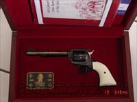 Colt KIt Carson New Frontier 22LR,1984,commemorative,#35 of 951,pres case,gold engraved,with book  Colt Commemorative Pistols