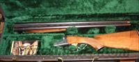 200E 12ga 26" Imp/Mod  Ejectors  SKB Shotguns