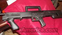 MAVERICK   BULL PUP TACTICAL  12 GA.  Maverick Shotguns