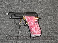 PT-25 Blued with Pink Grips  Taurus Pistols/Revolvers > Pistols > Steel Frame