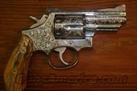 Smith and Wesson Model 66 2" fully engraved  Smith & Wesson Revolvers > Full Frame Revolver