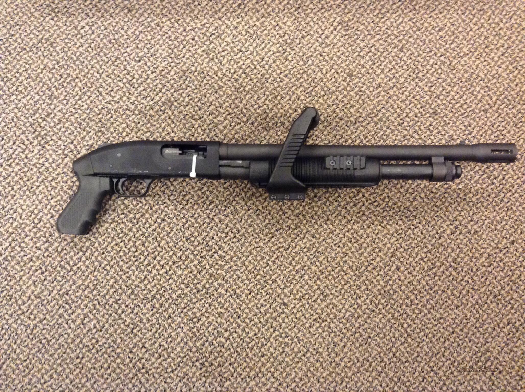 MOSSBERG CHAINSAW PISTOL GRIP 12 GA... for sale at