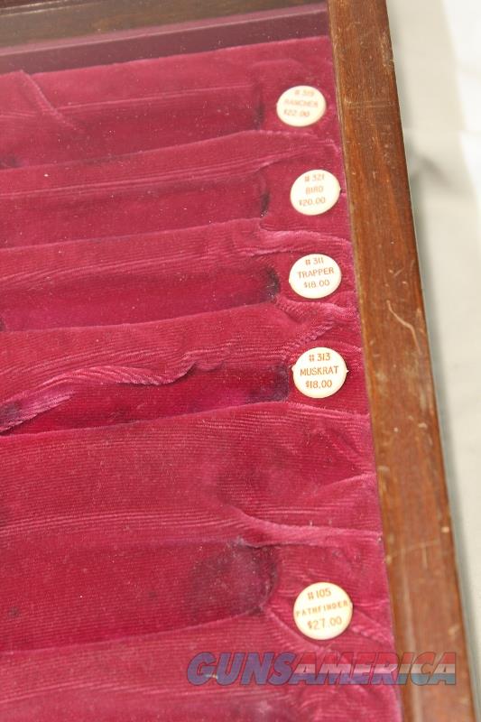 Buck Knives display case counter to... for sale at