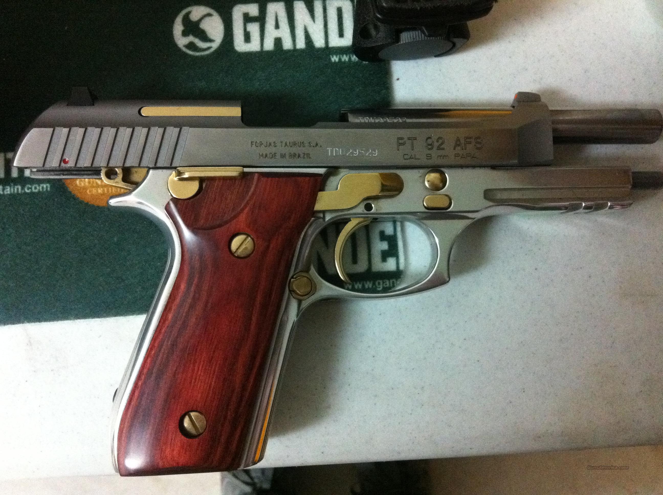 Taurus PT92 9MM Rosewood grips SS a... for sale at