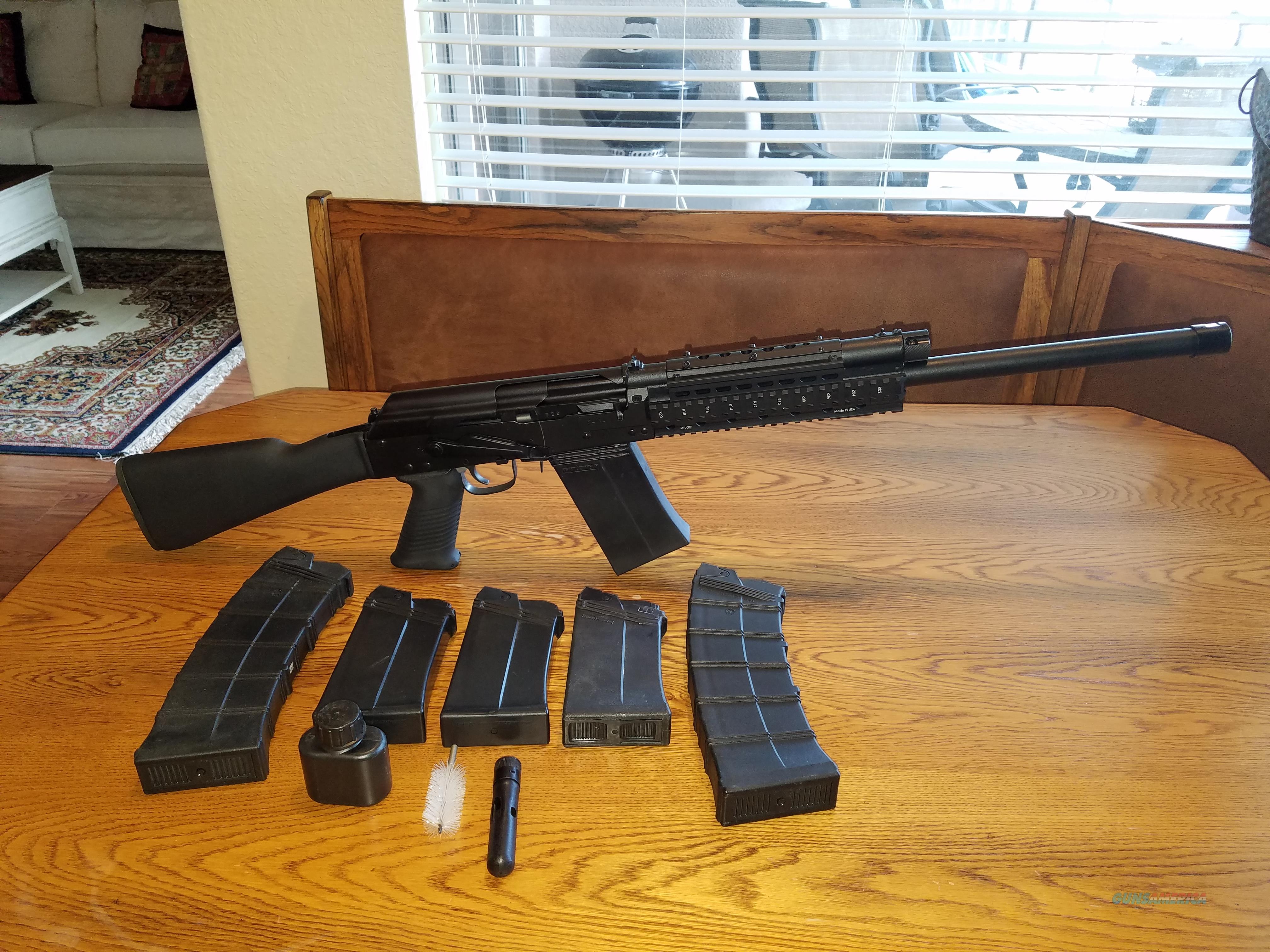 Saiga 12 with accessories for sale at 919880190