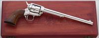 Colt Single Action Scout Buntline .22 LR, nickel, 9.5-inch, presentation case, unfired, layaway