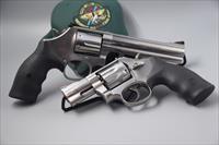 PAIR OF S&W MODEL 686 STAINLESS .357 MAGNUM REVOLVERS - 