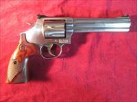 Image result for Smith & Wesson S&W Model 686-6 ‘Distinguished Combat Magnum’ 164194, Stainless Steel 6” 6-Shot, Double Action Revolver