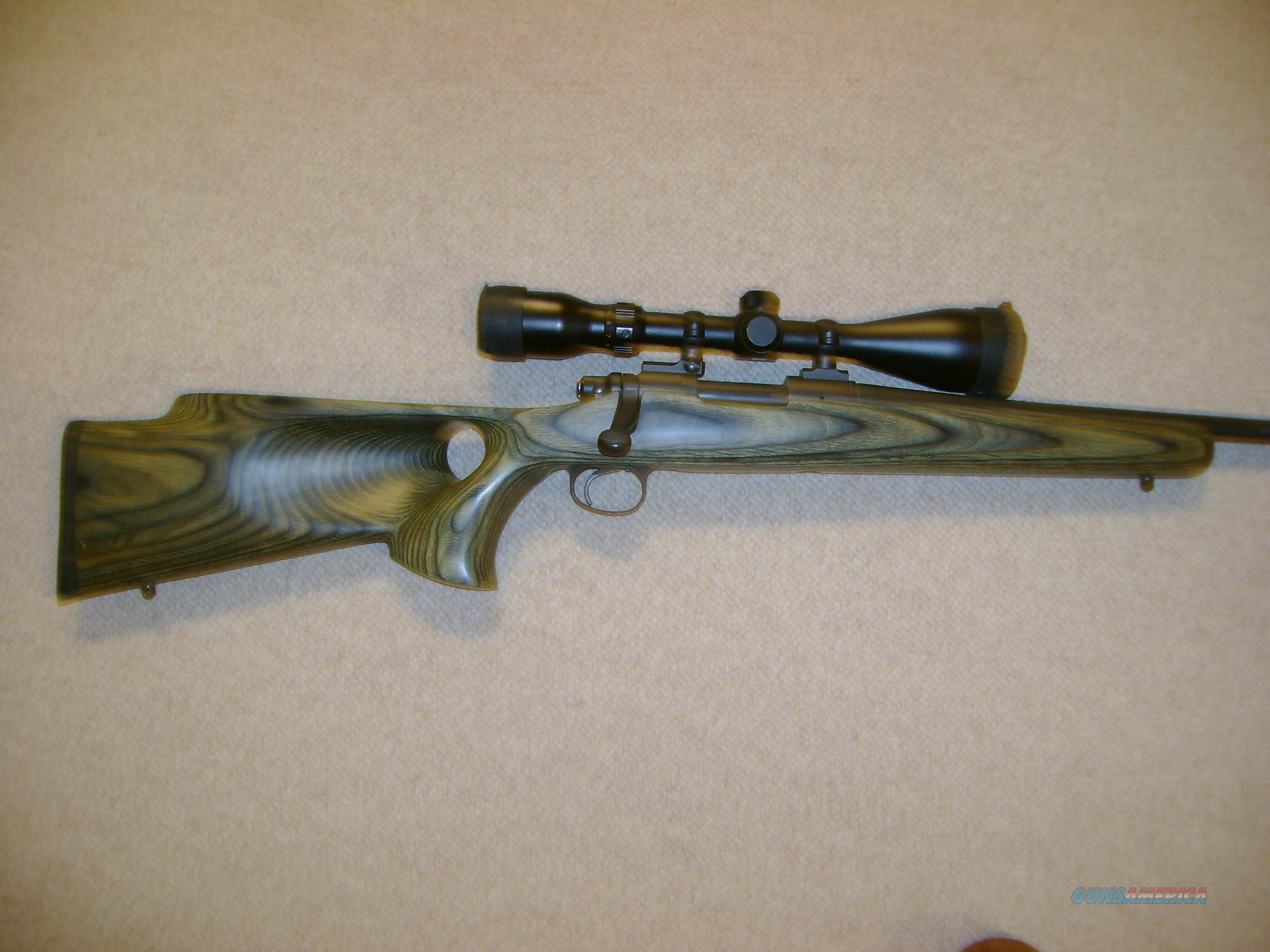 Remington 700 22250 with Boyds thu... for sale at