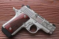 Kimber Micro 380, fully engraved by Flannery,new in box, holster,soft case etc