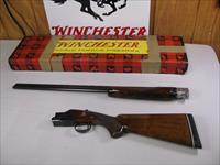 7767  Winchester 101 20 gauge 26 inch barrels skeet/skeet, 2 3/4 chambers, pistol grip with cap, Winchester box serialized to the gun, early good one with 2 brass beads, ejectors, vent rib, 99% CONDITION, Decelerator pad 14 1/4 lop, matches