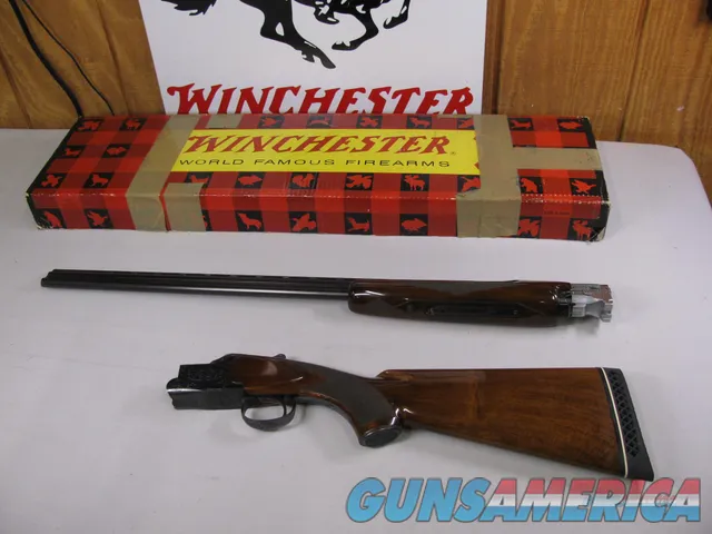 7767  Winchester 101 20 gauge 26 inch barrels skeet/skeet, 2 3/4 chambers, pistol grip with cap, Winchester box serialized to the gun, early good one with 2 brass beads, ejectors, vent rib, 99% CONDITION, Decelerator pad 14 1/4 lop, matches
