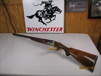 7850  Winchester 23 Pigeon XTR 20 gauge 26 inch barrels 2 3/4&3 inch chambers, ic/mod, round knob, vent rib, ejectors, Winchester butt plate, rose and scroll coin silver engraved receiver, opens closes tight, bores bright shiny, 2 white bea