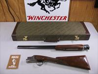 7757 Winchester 101 Pigeon XTR FEATHERWEIGHT 20 gauge 26 inch barrels ic/mod STRAIGHT GRIP,vent rib ejectors, Winchester butt pad, correct Winchester case, 2 white beads, Quail and Woodcock coin silver engraved receiver, very hard configura