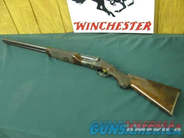 6198 Ithaca 6 E Minier 12 gauge 30 inch barrels, vent rib,ejectors,full/extra full, mfg 1907,4 gold raised relief dogs,duck quail,AA++fancy walnut,brass front bead checkered side panels,fleur-des-lies checkered wrist,case colred receiver,It