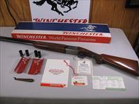 7762 Winchester 101 LIGHTWEIGHT 12 gauge 27 inch barrels, 6 winchokes, 2 pouches, wrench, complete set of Winchester papers/HANG TAG, box is serialized to the shotgun, A+ Fancy Walnut, Pheasant, Quail, Woodcock coin silver engraved receiver