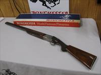 7747  Winchester 101 Pigeon XTR 12 gauge 28 inch barrels,MOD/FULL,  2 3/4 chamber, round knob, Winchester butt plate, AS NEW IN CORRECT SERIALIZED WINCHESTER BOX. 2 white beads, rose and scroll coins silver receiver, excellent ,A+fancy waln