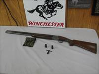 7545 Winchester 101 LIGHTWEIGHT 20 gauge 27 inch barrels 4 winchokes sk ic mod full choke tube pouch, wrench, pistol grip Winchester pad, pheasants/quail game scene engraved coin silver receiver. vent rib single trigger ejectors, 97% or bet