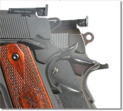The grip safety on the RO has the bump at the end to insure a more positive release when you draw it quickly for competition. Behind it is a Remington Rand set up for competition with an old Bo-Mar sight. Note the difference in the thumb safety as well. The RO is a large flat paddle with grooves you just can't miss. The grip safety on the RO has the bump at the end to insure a more positive release when you draw it quickly for competition. Behind it is a Remington Rand set up for competition with an old Bo-Mar sight. Note the difference in the thumb safety as well. The RO is a large flat paddle with grooves you just can't miss.