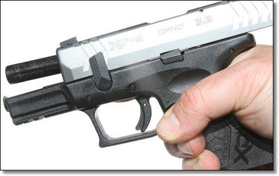 Simple disassembly and re-assembly is a big selling point for the XD line. You lock the slide back, flip that lever, and the slide comes off the front. Simple disassembly and re-assembly is a big selling point for the XD line. You lock the slide back, flip that lever, and the slide comes off the front.