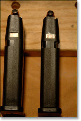 Gen 3 Magazine (left) compared to the Gen 4 Mag (right).   The Gen 4 magazine has cuts on both sides of the magazine body for the magazine release to be reversed for left handed shooters. 