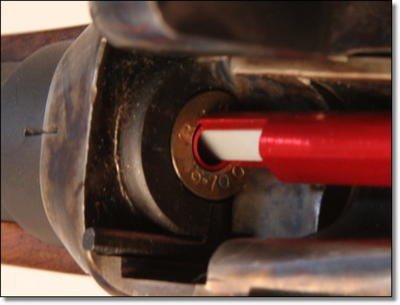 A close-up of the cartridge seated in the breech