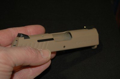 photo 2 The new Novak sight version of the R-1 with a brass bead front sight.