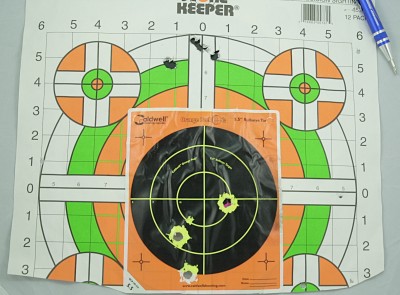 The four plated discs of each of the two 3” Winchester PDF1 Defender shot into two groups from ten feet, one for each barrel. Most of the 16 BBs missed the target.