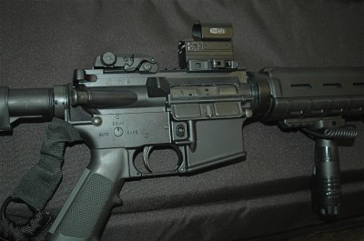 The M-RAD mounted on a flattop AR needs the two spacers provided but gives a great sight picture for such a small sight.