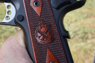 The grips are Cocobolo, and if you look at the grip safety, it has the bump for a more positive release in a quick draw and fire.