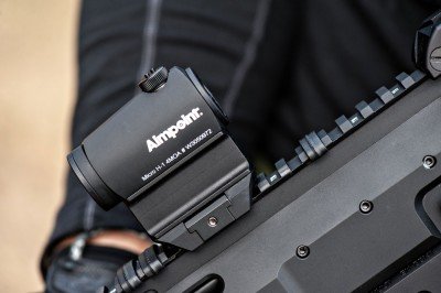 Aimpoint Micro H-1 Review Side view of Aimpoint H-1 in Aimpoint High Mount