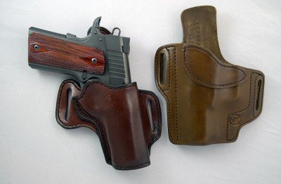There’s a world of holsters available for the 1911. Here are two reasonably priced quality leather holsters. The one on the left with the gun in it is a right handed Extreme cross-draw made by Mernickle Holsters in Fernley, Nevada. The holster on the right is a left handed strong side Predator model made by Wright Leather Works in Green Springs, Ohio.