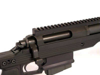 The AR-31’s beefy action sports an 18” long 20 MOA rail that ensures you’ll have the elevation needed to get out to longer ranges. Like many purpose built custom actions the ejection port is just the right size to easily eject cases but not so large that it compromises rigidity. Also visible is the paddle safety at the rear of the bolt, while functional it proved to be a little awkward to actuate.